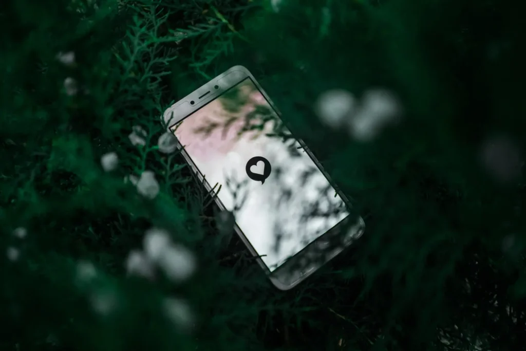 a cell phone in the grass